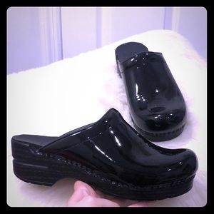 Dansko patent leather clogs
